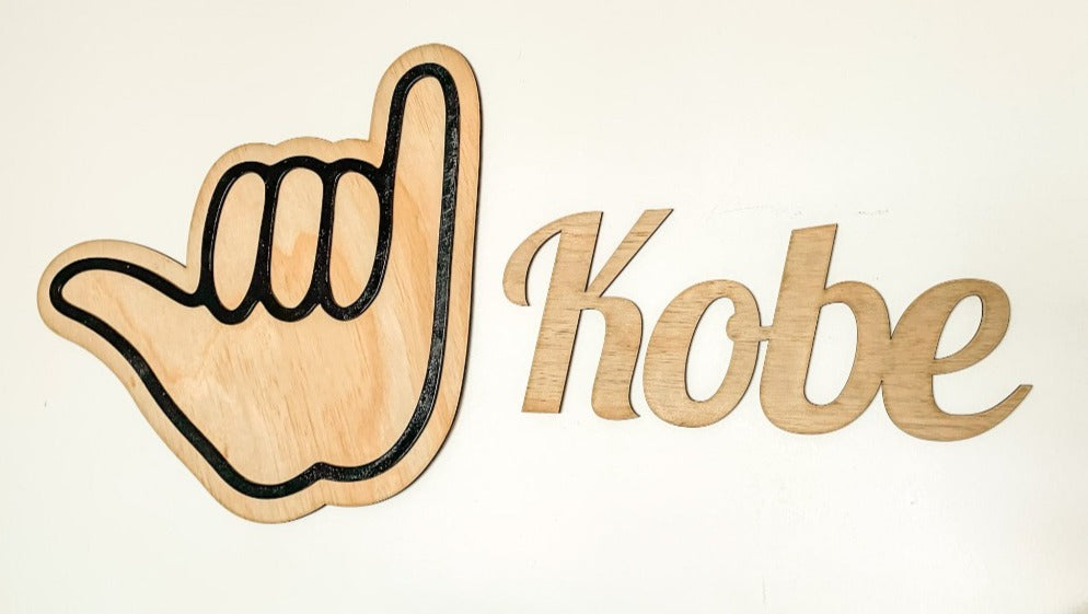 Personalised laser cut name sign for kids room decor.